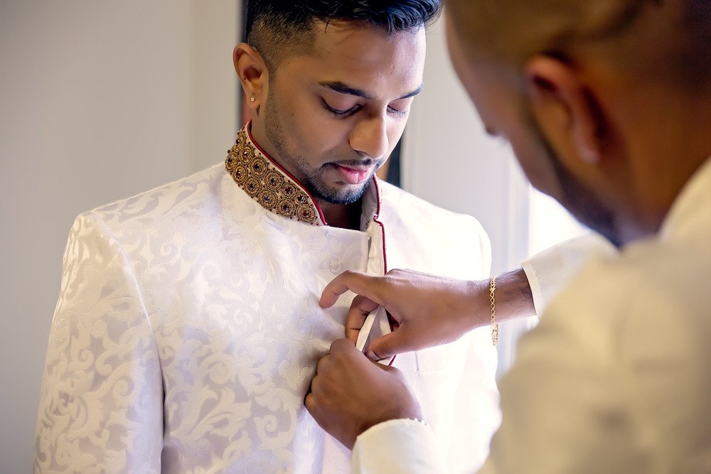 groom getting ready Sathya Sai Centre Scarborough toronto wedding photographer